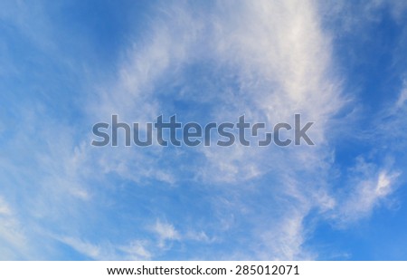 Heavenly blue sky with puffy clouds