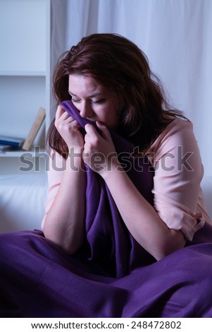 Woman at night suffering from depression