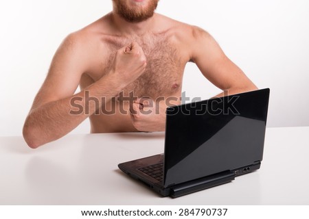 A man showing chest in front of webcam