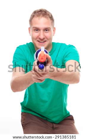 Man with water gun toy