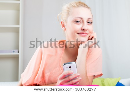Subtle girl with fair complexion with mobile