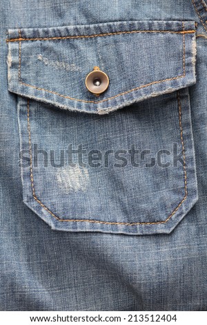 Denim shirt pocket. Closeup.