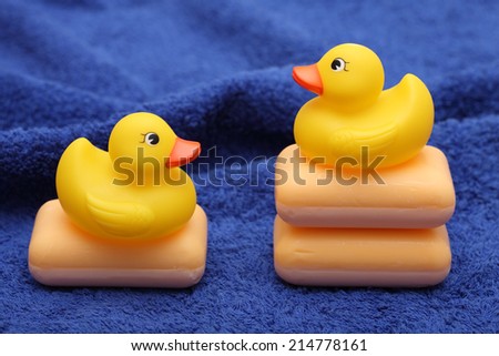 Rubber Ducks on the soft towel and soaps.
