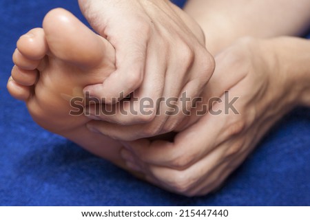 Foot massage. Massage of one foot.
