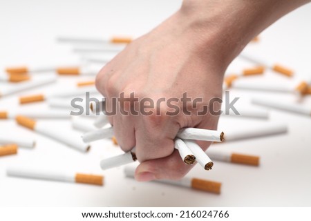 Man trying to give up smoking. Conceptual image.