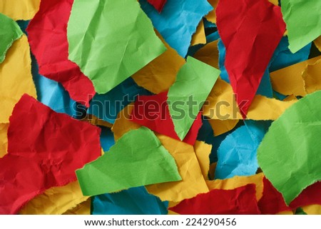 Colorful crumpled and torn, pieces of paper. Paper background.