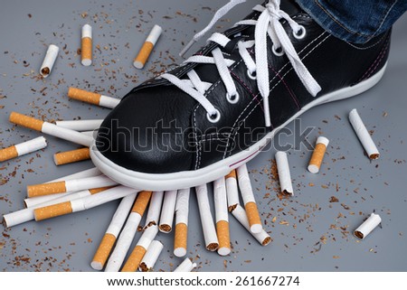 Enough! Man trying to give up smoking. Conceptual image.
