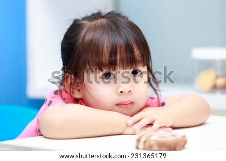 Asian girl sitting smiling happily acted ideally.