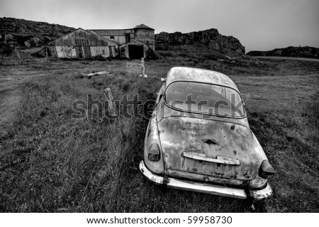 stock photo Abandoned car and farm in black and white end of the word