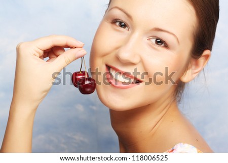 happy woman with cherries