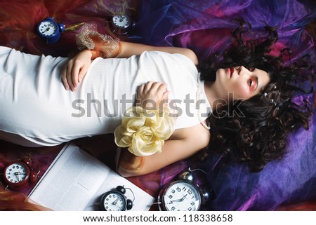 beautiful young woman lay on organza. Sleeping beauty.