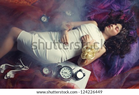 beautiful young woman lay on organza. Sleeping beauty.
