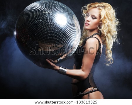 dancer girl in smoke with disco ball