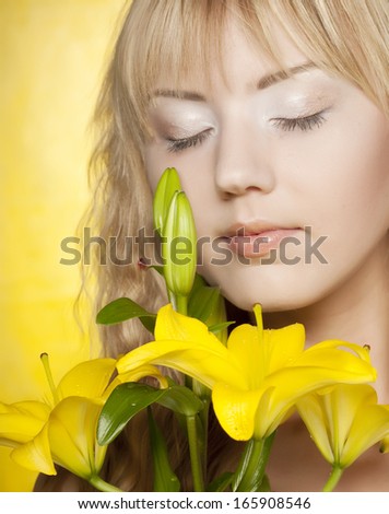 happy woman with yellow flowers