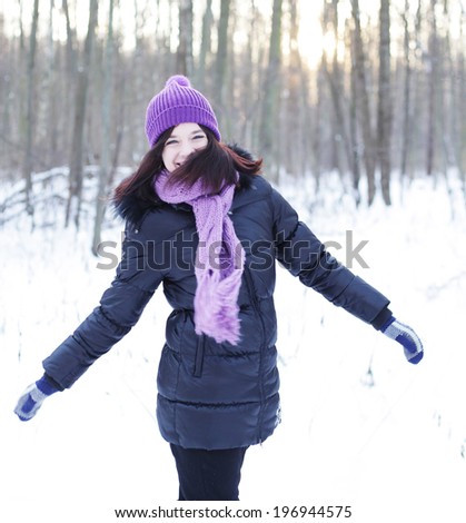 winter woman jump in park