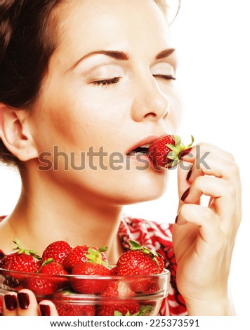 Young beautiful happy smiling woman with strawberry .