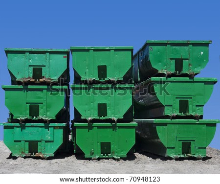 Green Containers used to transport recyclable materials