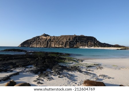 One of the many islands of the Galapagos, seen from the beach. Galapagos Islands, Ecuador