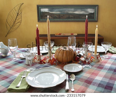 Autumn Fall theme Thanksgiving dinner table place setting