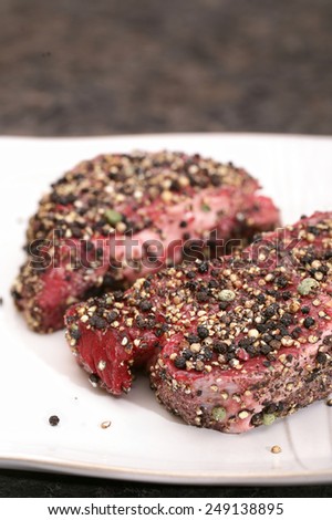 Filets prepped with dry rub before pan seared
