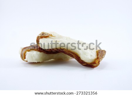 isolated of dog snack ,dried chicken meat wrap with milk dog bone