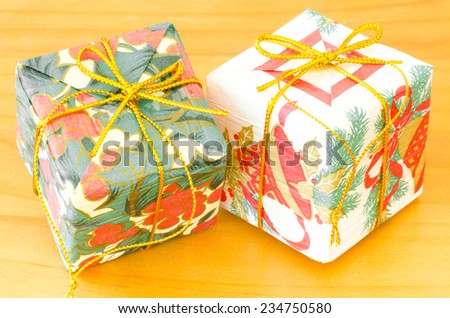 Colorful gift box on wooden background