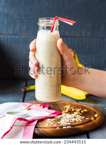 banana smoothie with oatmeal and nut paste,hand-held bank