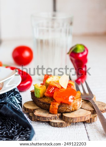 Roasted vegetables on rye bread, snack, vegan healthy food