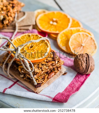 Citrus Homemade granola protein bars with peanut butter, honey and dried fruit, healthy food