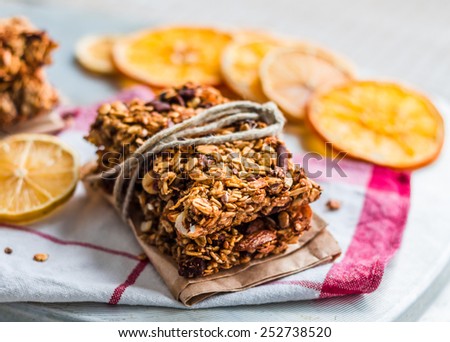 Citrus bars granola with oatmeal, seeds, nuts and dried fruits, healthy food