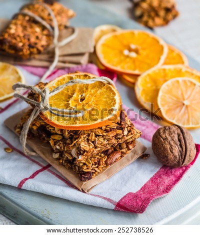 Citrus Homemade granola protein bars with peanut butter, honey and dried fruit, healthy food