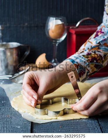the process of making biscuits, shortbread dough raw, cut shape, sweet pastries, hand
