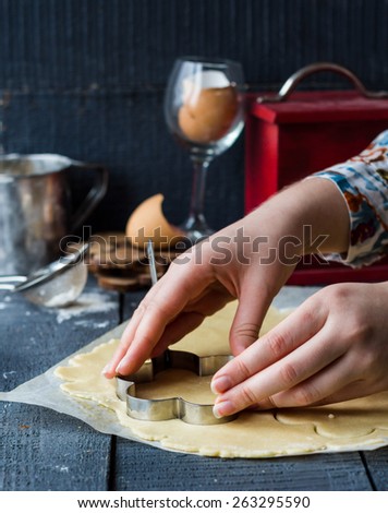 the process of making biscuits, shortbread dough raw, cut shape, sweet pastries, hand