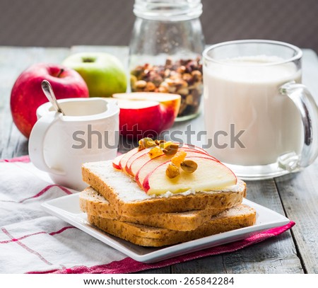 bran toast with cheese, apple and dried fruits, healthy breakfast, clean eating