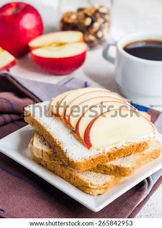 toast with cheese curd, honey and apple, a cup of coffee, a healthy breakfast