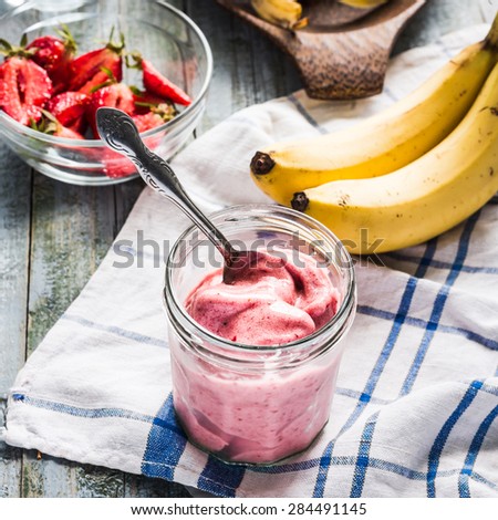 strawberry-banana ice cream in a glass, healthy dessert, summer,selective focus