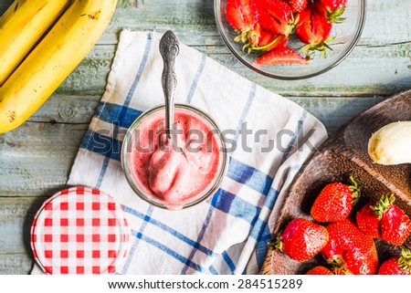 strawberry frozen smoothies in a glass fruit dessert, summer, clean eating,top view, banana