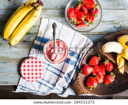 strawberry-banana ice cream in a glass fruit dessert, summer, clean eating,top view