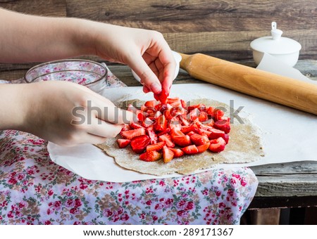 cooking processes rye and bran biscuit with fresh strawberries, vegan dessert, clean eating, pie