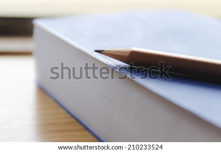Focus pencil and book