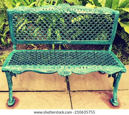 single  chair in the small garden