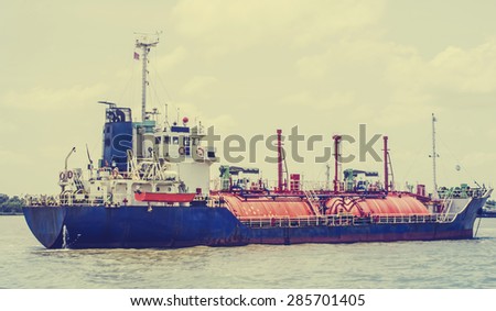Petrochemical gas energy in water transportation industry,vintage tone