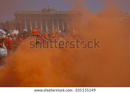 KHARKIV, UKRAINE  JUNE 13: Orange smoke in the Dutch fan zone before a UEFA Euro 2012 football match between Germany and Netherlands on June 13, 2012 in Kharkiv, Ukraine