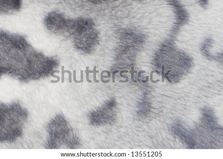 Close-up of fur fabric (blurred spotty background)