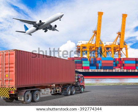Truck transport container and cargo plane flying above ship port with working crane loading bridge in shipyard for logistic import export concept