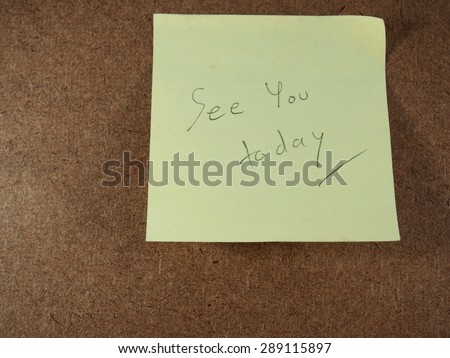 See you today, writing on yellow sticker paper, reminder on  brown board background