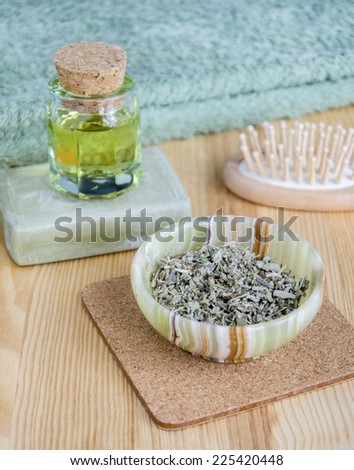 Dried herbs, oil and organic soap for skincare and haircare