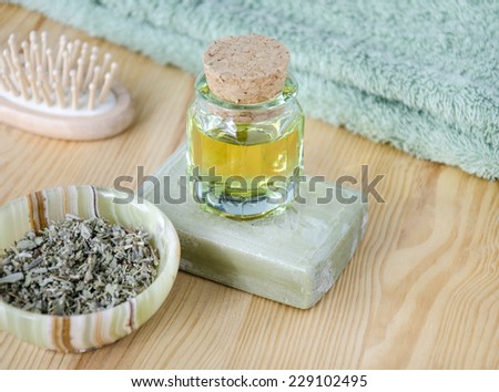 Cosmetic oil, organic soap and dried herbs for skincare and hair