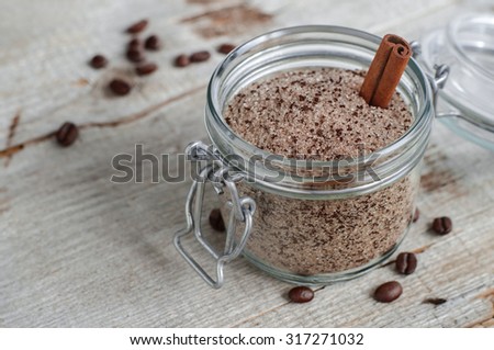 Homemade scrub made of sugar, ground coffee and cinnamon powder