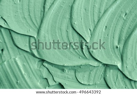 Green cosmetic clay texture close up